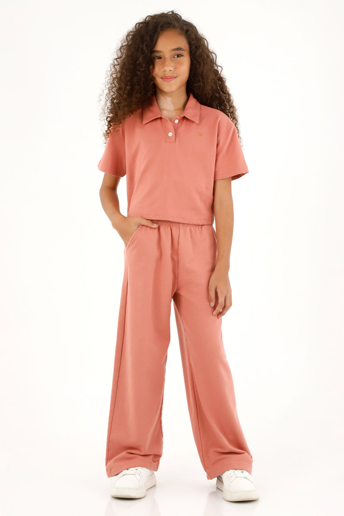 Camiseta tipo polo rosada para niña